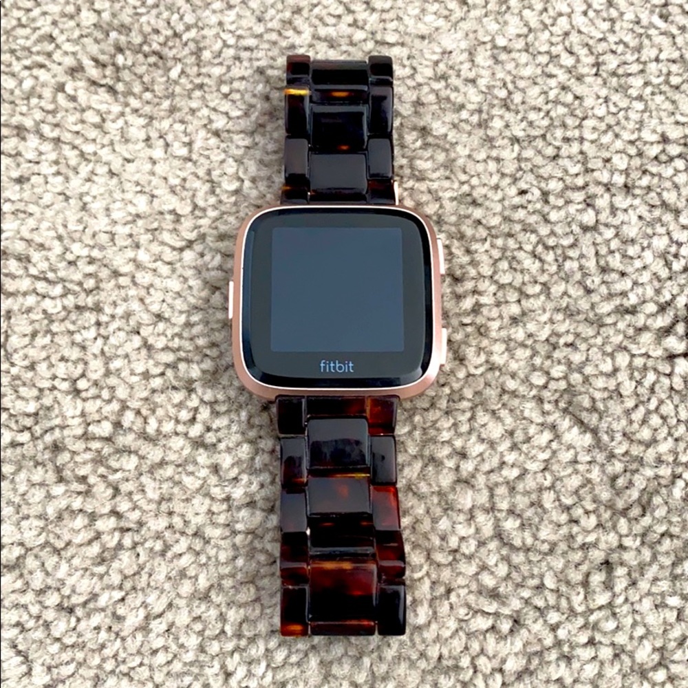 Rose gold Fitbit versa
